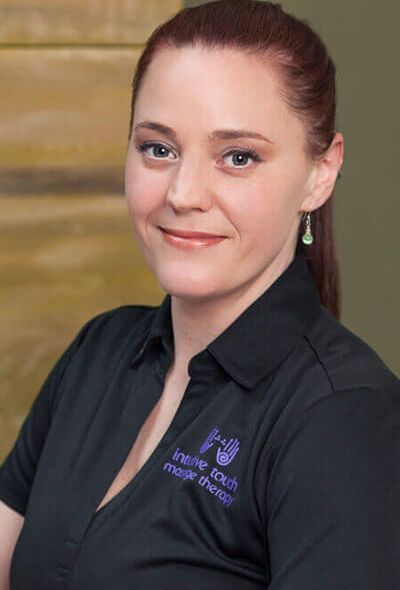 Headshot of Paula Beuerman, RMT in her treatment room